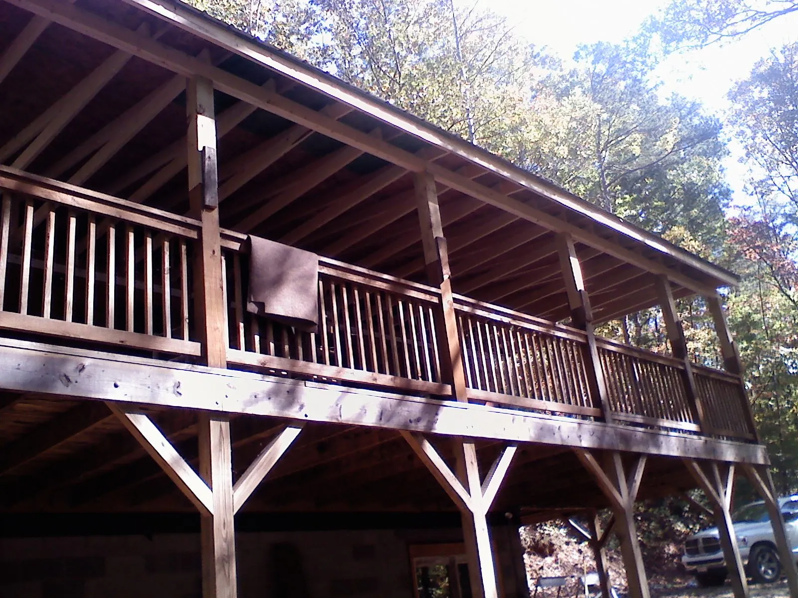 Timber framing under a new elevated porch and deck — Roof Leak Repair in Marine City by Roofing Brothers